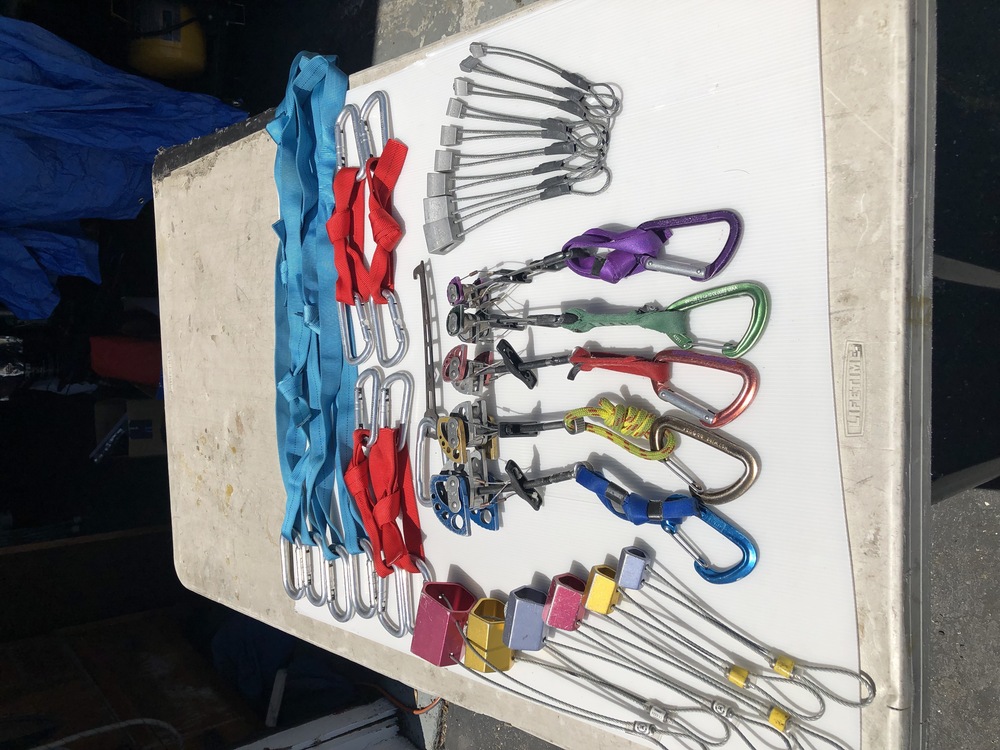 lots of climbing gear for sale trad rack, nut sets, harnesses, approach and climbing shoes