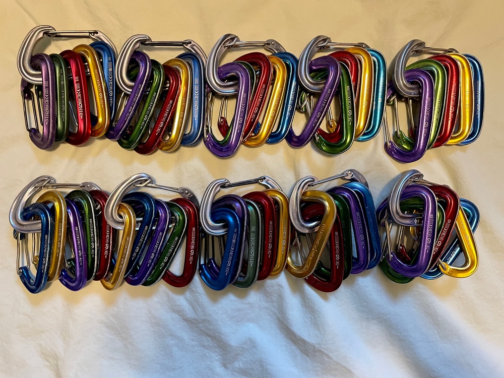 FS Lots of Black Diamond carabiners, Petzl quickdraws, and slackline setup