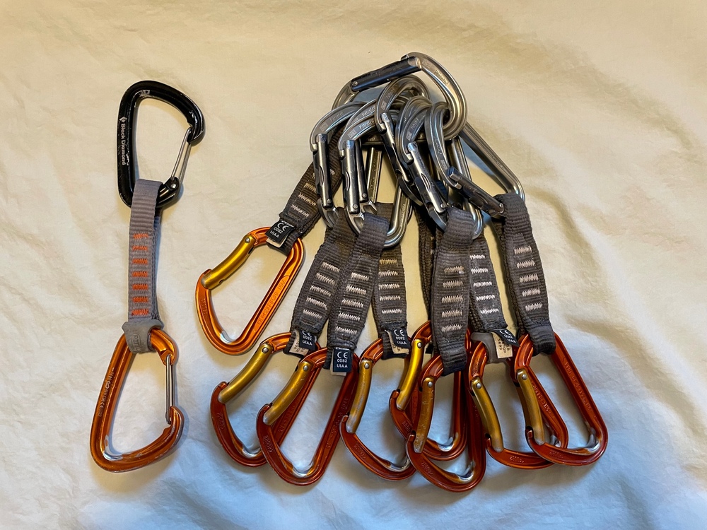 FS Lots of Black Diamond carabiners, Petzl quickdraws, and slackline setup