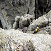 Angela climbing the crack on pitch two.