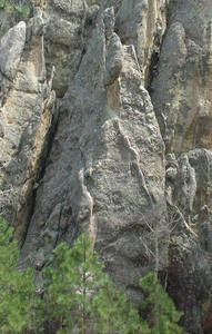 Sharkstooth is the rock formation that is centered in the photo.  It blends in with the background rocks (Shipyard Rock).