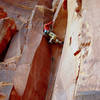 Karsten pulling crux of deseret moon.  Lots of small gear below.