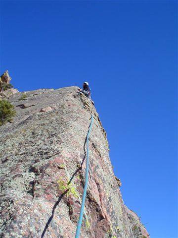 Jason Shatek moving up the very airy arete on the third pitch