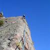 Jason Shatek moving up the very airy arete on the third pitch