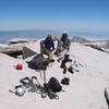Mike Morley and Jeff Crow atop Mt. Whitney after summiting the East Buttress on a bluebird day in late May, 2002.