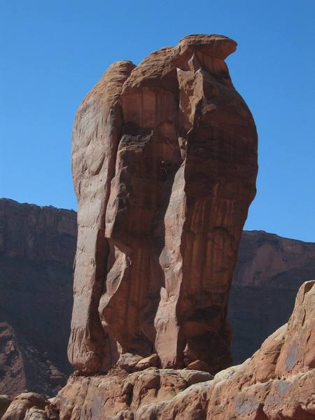 The three birds;  kind of hard to tell from this angle.  Right chimney is the obvious corner in the sun.  There is a climber at the belay.