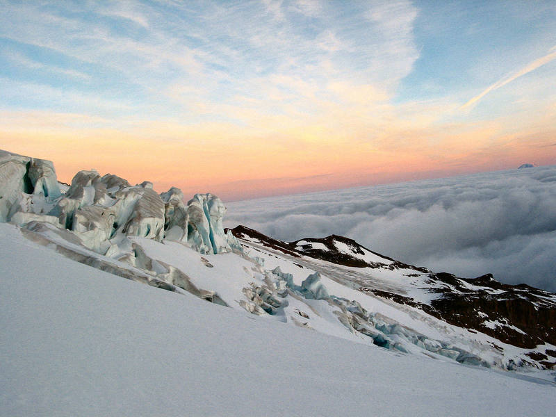 The Eliot Glacier at sunrise with Mt. St Helens in the distance.