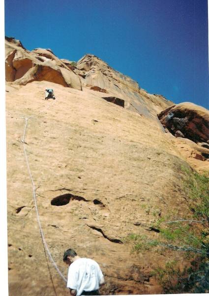 Dave Leading Listen to the Echo(10a) as Jeff attentively belays. 3/16/04 