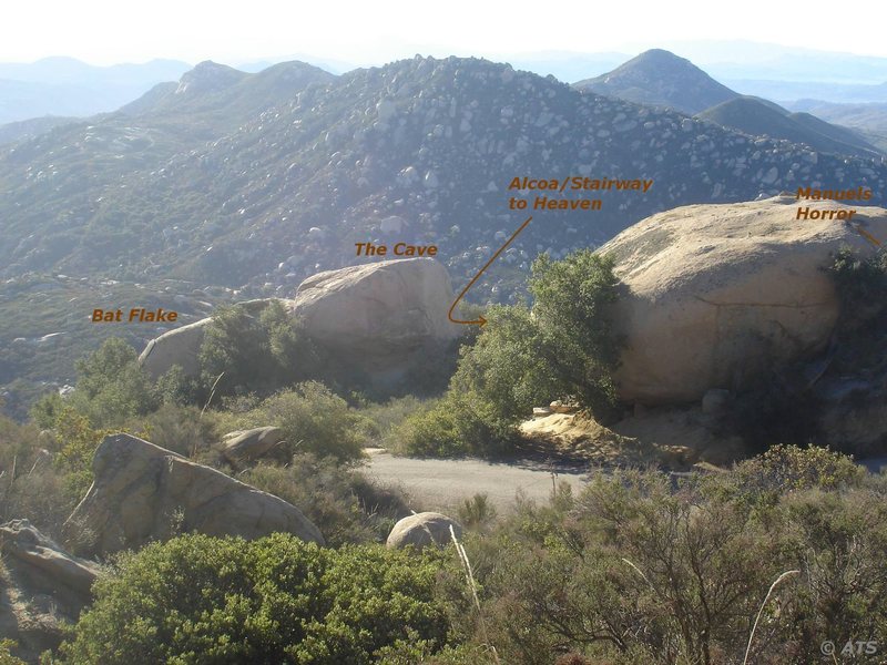 Just beyond the road is the (L) Bat Flake  , The Cave boulder in the middle and the (R) boulder more or less in the foreground is Manuel's Horror.  Stairway to Heaven takes a trail inbetween The Cave and Manuel's Horror.  