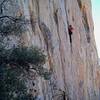 Keli on Distant Warning (5.10d), Valley of the Moon 