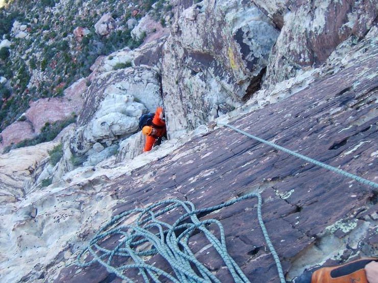 Looking down the loose chimney on pitch 4 of Canadian Club.