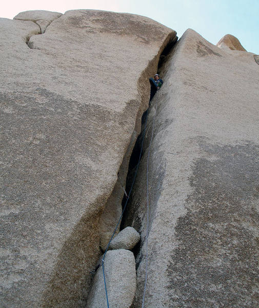 Kole on FA of Funnel of Love in brown squeeze visible from the road.  Excellent rock and secure moves make this a fun day.  Approach takes about 45 min.