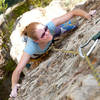 Rachel Maine, of Santa Paula, climbs the sustained upper-headwall of Economique.