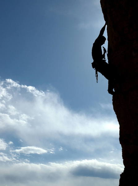 Jan pulling rope for a clip at Cactus Cliffs