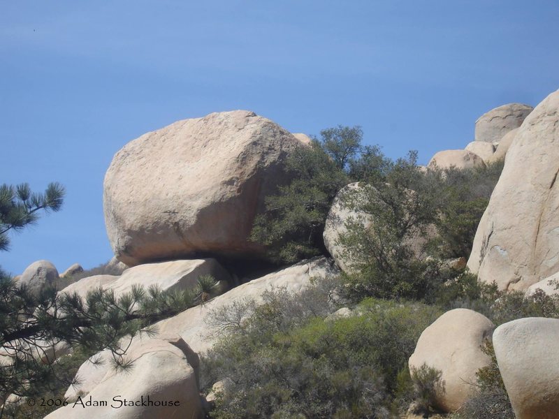 On the backside of this boulder is Eric's Crack (5.9) and Hellraiser.  Mr. Snoid rock is on the right in the photo.  