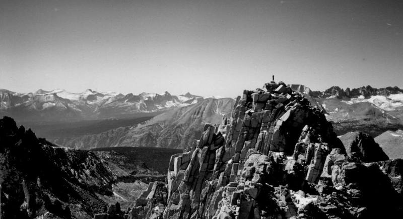 Owen on the summit of Russell. Great Western Divide and Kaweah Peaks Ridge behind.