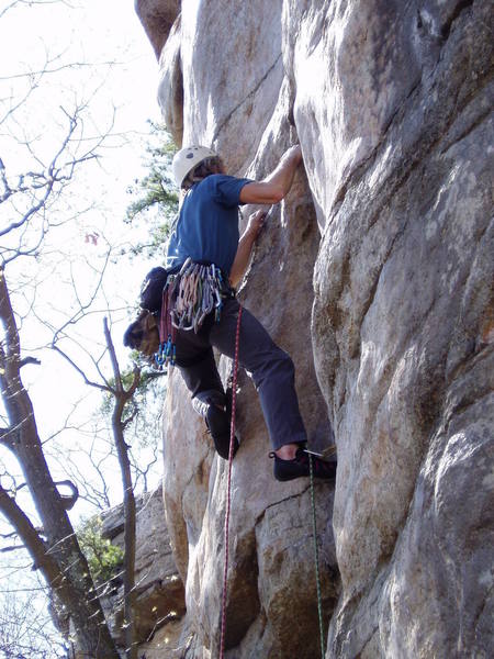 Placing an Alien after the first crux. You can also slot in a very good medium-sized nut. The piece at my feet protects the move to this point, but it may not be good enough or high enough to keep you from hitting the starting block.