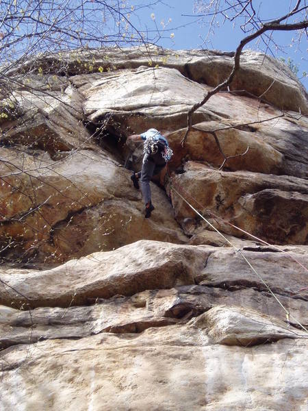 Undercling the roof. Just keep going--it gets easier, until you're stemming at the lip of the roof. A fall here would be ugly, but also unlikely.