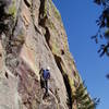 My right foot is on a key hold used to make the hard move to reach a finger lock. Photo by Tony Bubb.