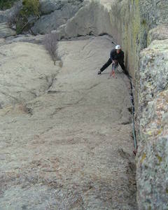 Dawn Glanc, Hanging Out at the Belay On SOLER Route. This Photo Well Shows the Joy and Purity of This Line. There is NOT a Single Move That is Short of Excellent on Both Pitches!!! It was First Climbed in 1951, on AID by Tony Soler et.al.It was the First Aid Climb (Other Than the Stake Ladder of the 1890's) on the Tower. In 1959 Layton Kor and Ray Jaquot Made it all Go Free, so it, Ironically, Became the First Aid Line to Get Free Climbed on the Tower. Today, it is Still a Great Climb. I've Been up it More Than 100 Times,and...I Can Hardly Wait to Share it With a Partner, Again!!!! Photo compliments of Frank Sanders www.devilstowerclimbing.com