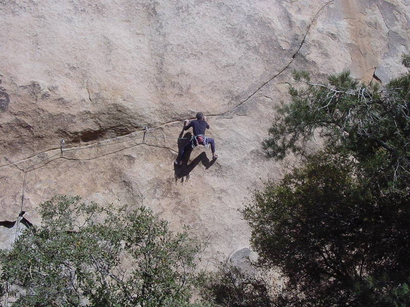 Bobby P. moving through the sustained crux section on the first pitch. 