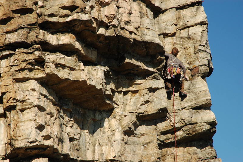 Mike nearing the end of the crux, a few feet above the pins.  It was a nice on-sight.