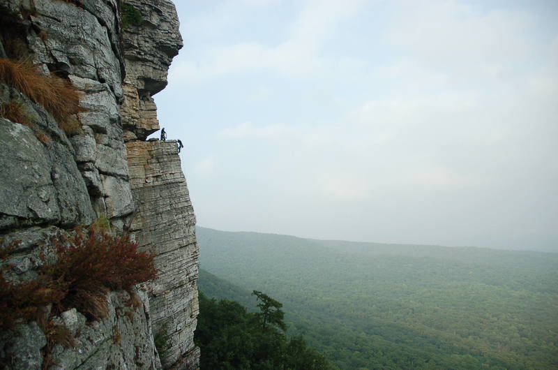 Same climber, reaching the High E ledge.