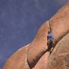 David near the top in the overhanging part of the climb.