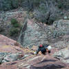 MK following with the drill on Dave Christensen Memorial Route FA.  We stumbled onto a gem.  The crack comes and goes but the holds keep on coming.  Mike is about 250' above the ground and the exposure is huge.  