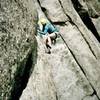 Steven Gale following Orange Julius (5.9 or 10b), Circa 1995. Lumpy Ridge, Colorado. 