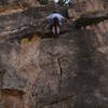 Bro Dalon just beyond the crux move leading "Snap, Crack, or Pop"