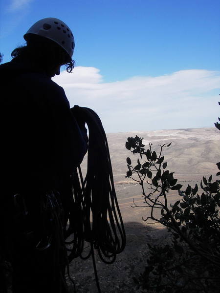 Coiling the rope for rappel on The Res.  I was glad to be heading down, and felt a lot less serene than I look!  Next winter may be seeing another attempt though!  Photo by Tom Gray.