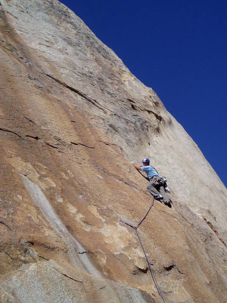 Glad to get to larger holds, Paul looks back at 1st crux.  Many more to go!