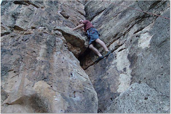 Jared on TR and just past the crux layback (kinda) spot and getting ready to move onto the face to his left