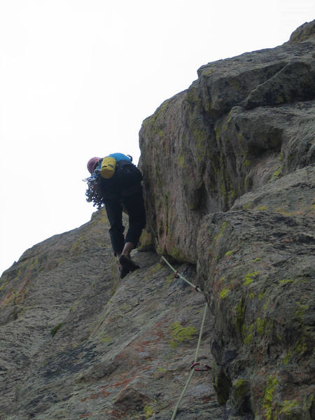 It's getting harder here and the end has some surprises. I won't spoil for you, but it does not quite end as I expected. Your partners have a nice big comfy ledge to watch you work the crux and take pictures. (Photo by John Courtney)