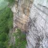 Mike at the belay ledge below P3.