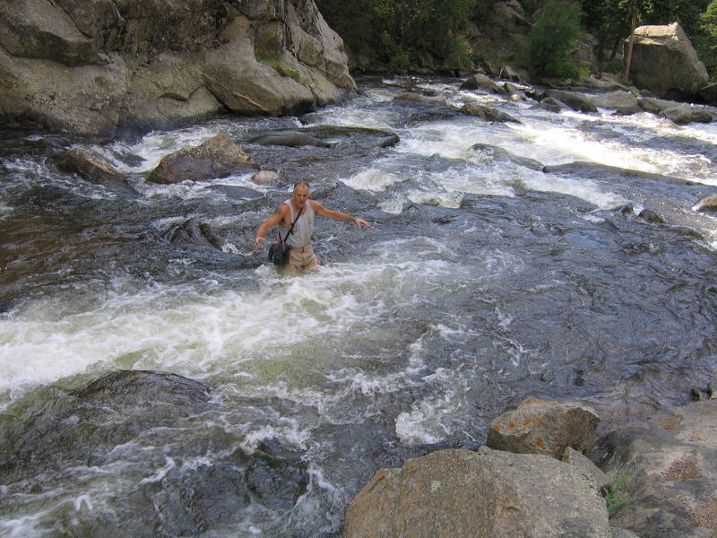 Bob hiking back to car after first ascent.