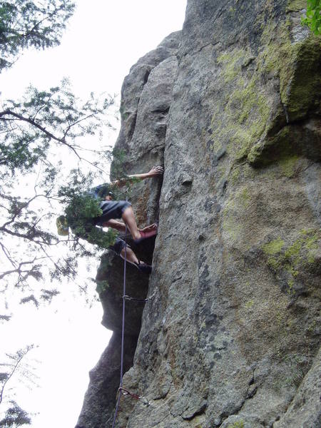 The crux. You can either layback all the way up or step left onto the lip and attempt to pull over onto your foot.