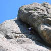 My wife climbing the Conn route on Aquarium rock