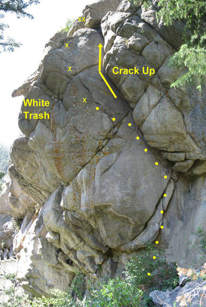 Crack Up and White Trash.  Crack Up climbs the overhanging hand and fist crack.  White Trash steps left and climbs the steep arete past three bolts.