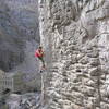 Red-pointing in the Owens River Gorge at Solarium. The ruins-of-Mordor ambiance and occasional self-chalking slopers might deter some.  But the view of the Sierra from up at the cars makes up for the gloominess.  And the awesome quantity of great routes on bullet-hard, pocketed, basalt places the Gorge a cut above all other western sport areas, (except maybe Smith Rock).  Thank you first-ascensioneers!