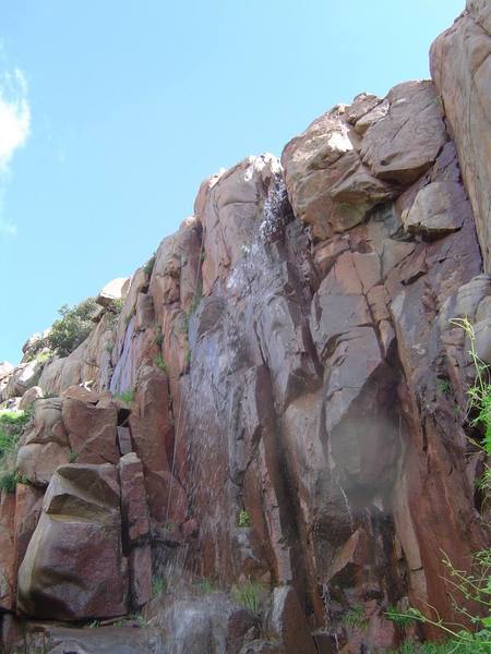 The Rift.  The top is the waterfall.  The start has water dribbling out of it.  Now we know why this thing is so darn slick!<br>
<br>
Some nut set up a rope nearby to take a pic climbing in a waterfall.  Crazy.