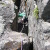 Hessie Chimney in lean conditions, 7/21/06.  My friend Chris and I were looking to sharpen our drytooling skills, but we didn't want to scratch up any rock routes, so we climbed this route.  As too be expected, the route was rather loose without the ice, but it still felt about M5ish.