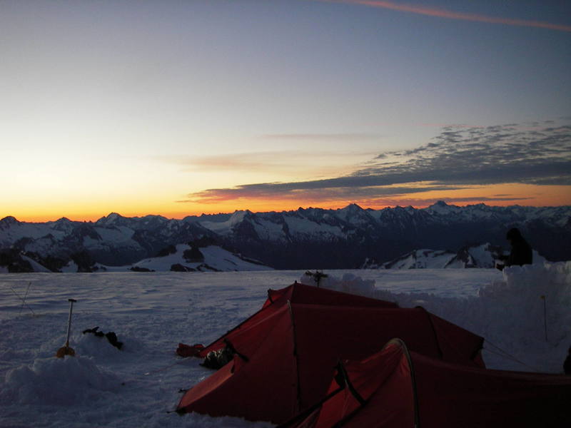 The Dragontain high camp on the Upper Tellot Glacier at sunrise.  Photo by Tom Gray.