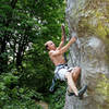 Ryan clipping at the crux 2nd bolt.