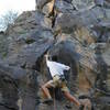 Jason entering the crux move on Superfly