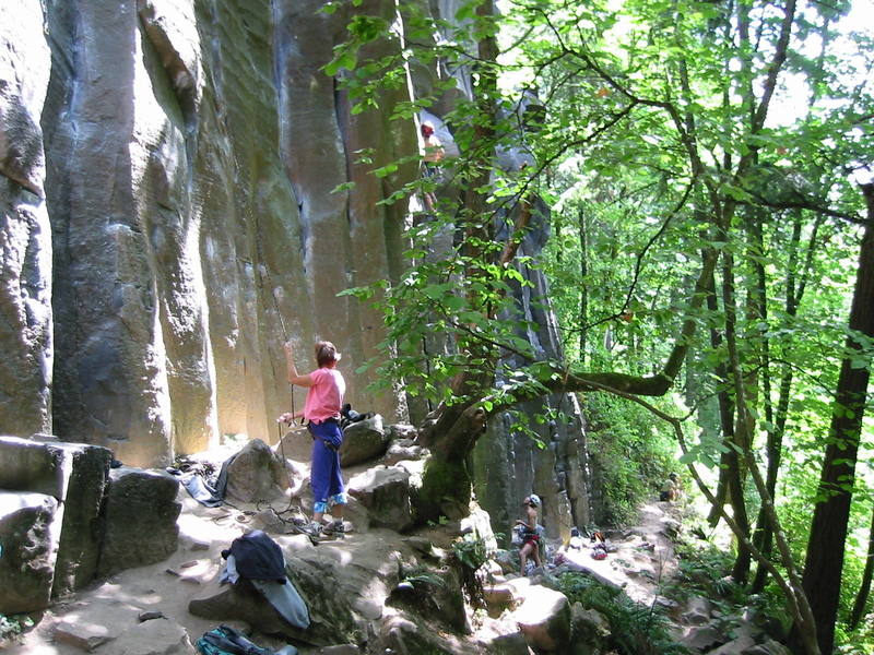 View from under Sheer Stress of the belay zone in humid summer conditions. I was surprisd by the excellence of this crag, especially the 5.10 and 5.11 on the Red Wall.  Close to the airport, Columbia River Gorge, and a bunch of skiable volcanoes too.  Morning shade is best when the heat is on.     