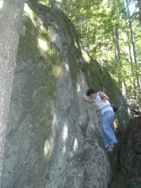 Karen's Stuck (Falling off of the mossy topout holds).  I had to clean the holds while climbing)