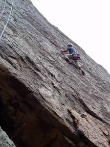 Approaching the second bolt. After the initial the roof the route moves right then diagonals left past the second bolt then straight up to the third bolt.