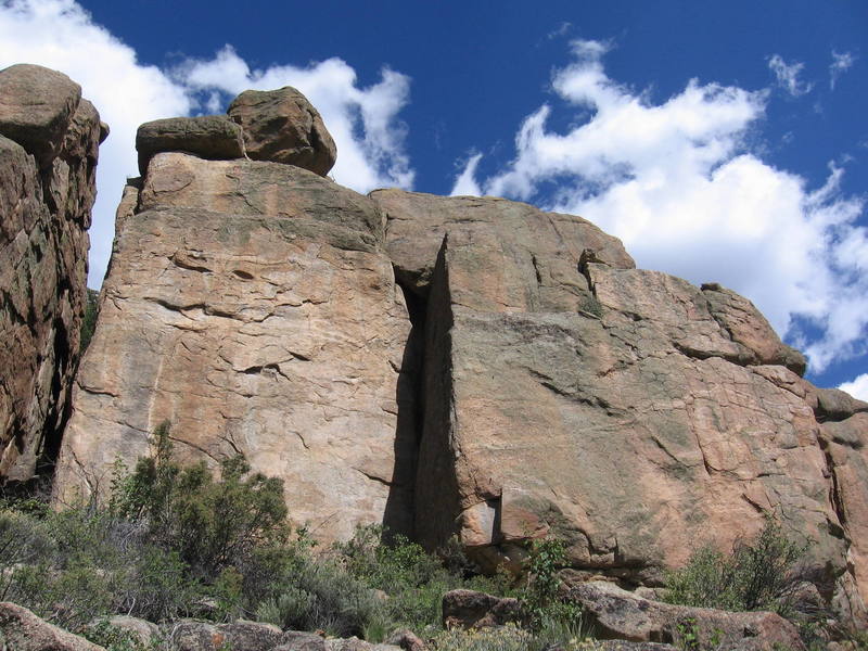 Pleasure dome area... The arete on the left goes at 11c/d, the next route to the right (face) is 11a, then there is a route on the face in the shaows on the next pillar over that goes at 11b/c, then the left arete goes at 12b/c, then the face on the right piece of rock goes at 11a.